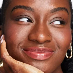 Revolution Pout Bomb Plumping Gloss Cookie Warm Nude